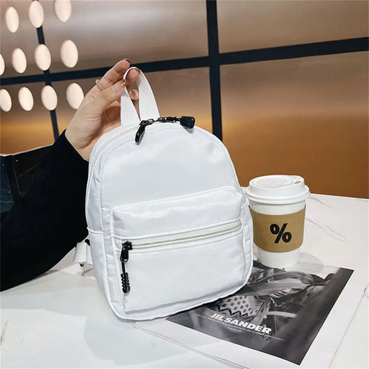 Korean Nylon holographic backpack Women Casual Solid Color Small Schoolbag Travel Bag For Teenager Student School Bag Back